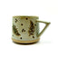 TAZA CERAMICA PLUMAS NAV. 250ML 7.5X7.5CM